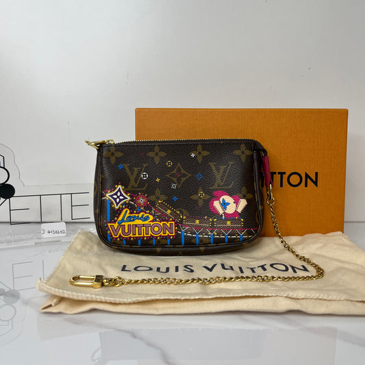 Louis Vuitton Monogram Vivienne Animation Mini Pochette - Lafayette Consignment