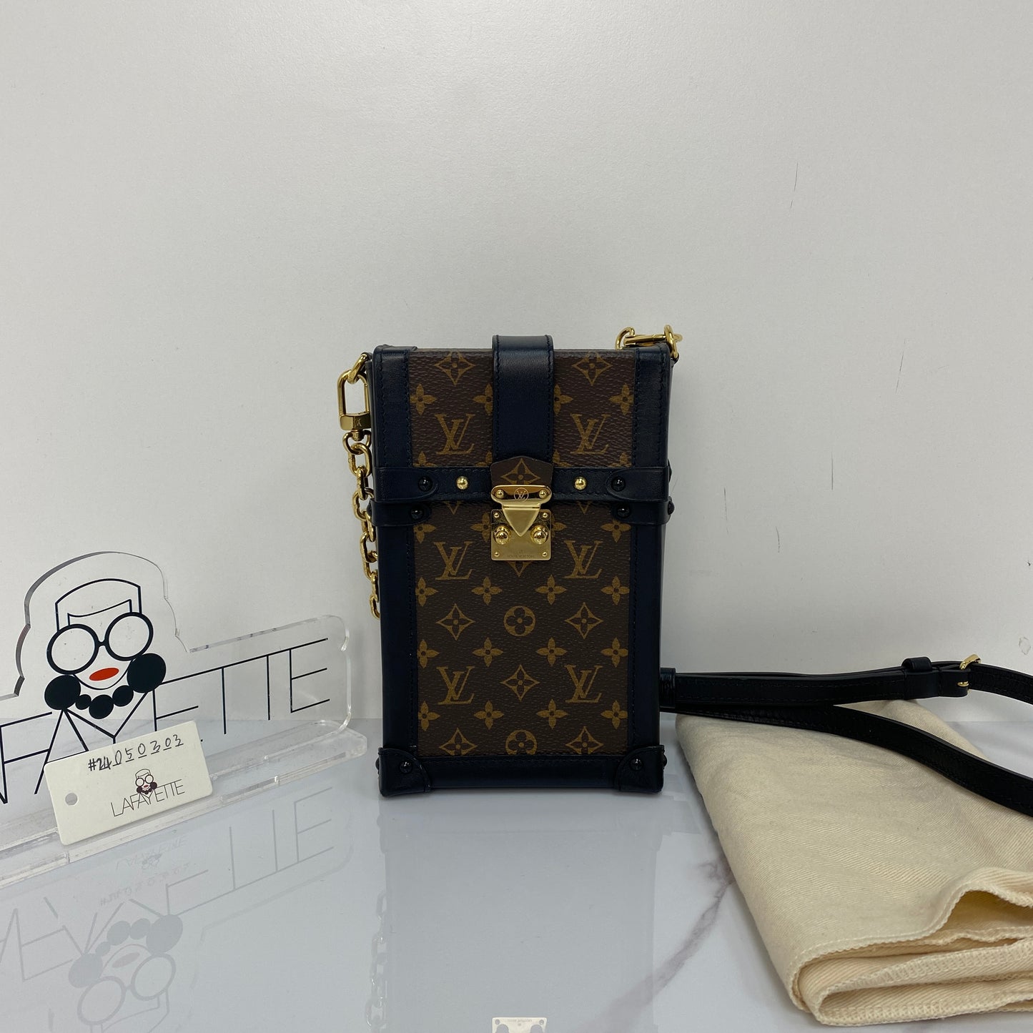 Louis Vuitton Vertical Trunk Pochette - Lafayette Consignment