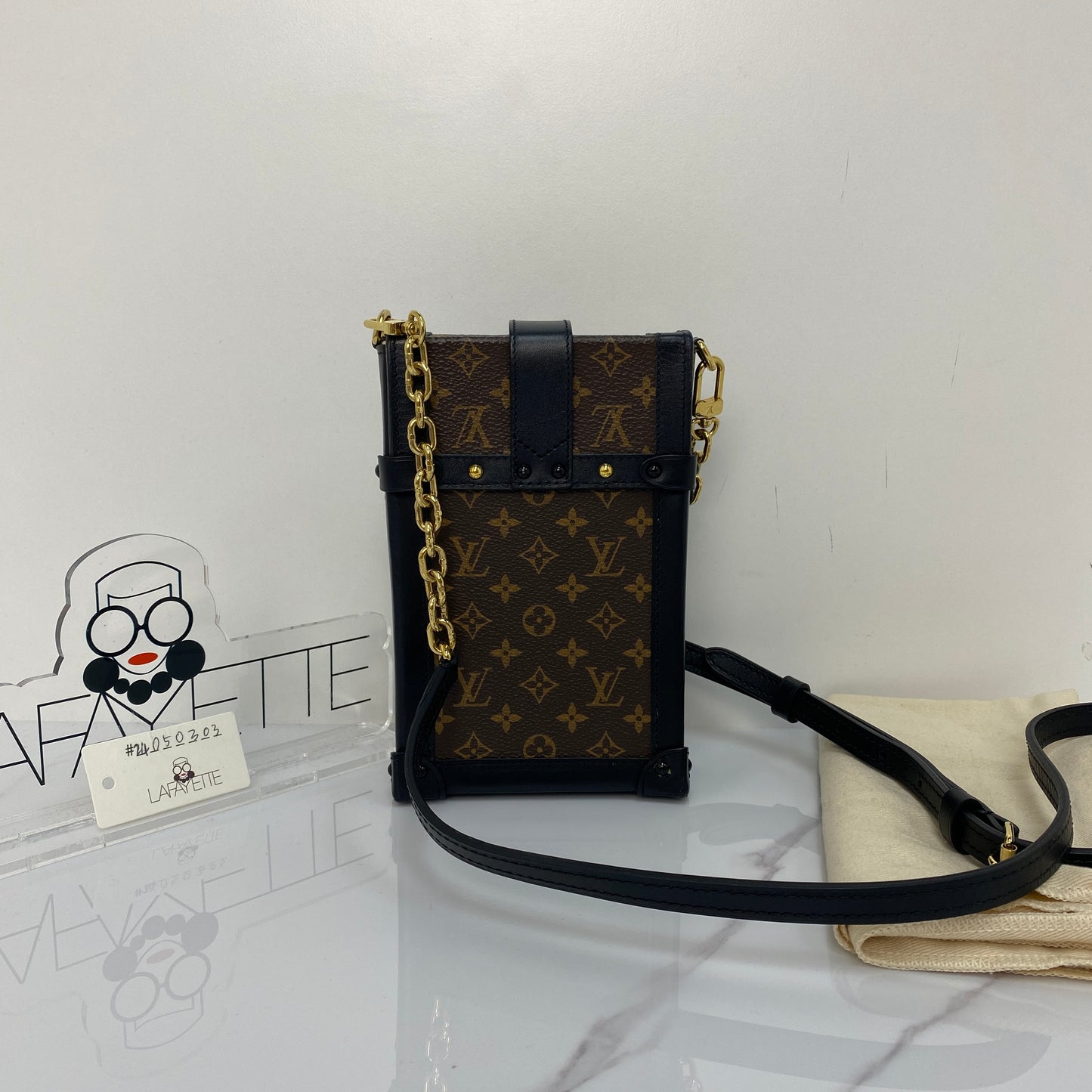 Louis Vuitton Vertical Trunk Pochette - Lafayette Consignment