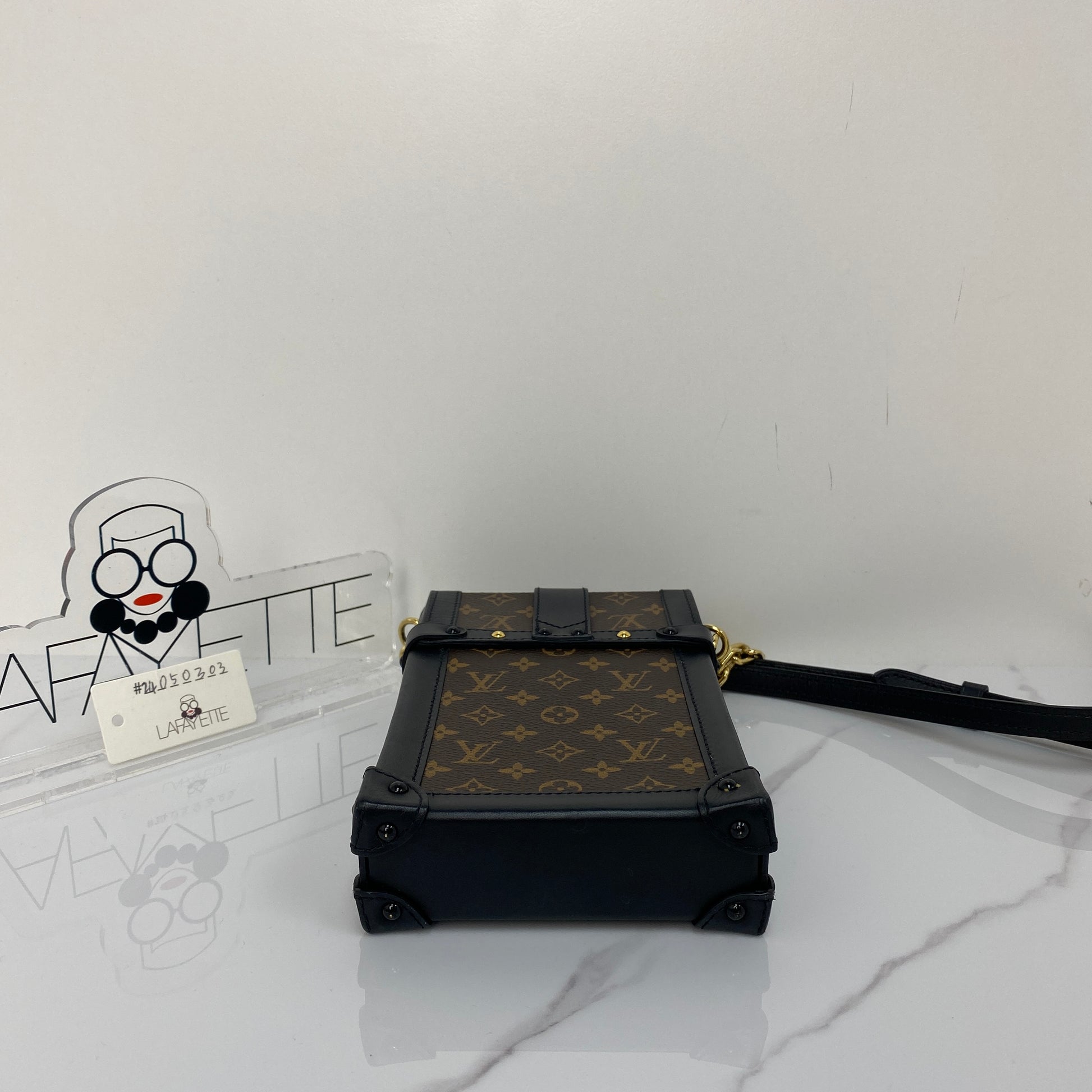 Louis Vuitton Vertical Trunk Pochette - Lafayette Consignment