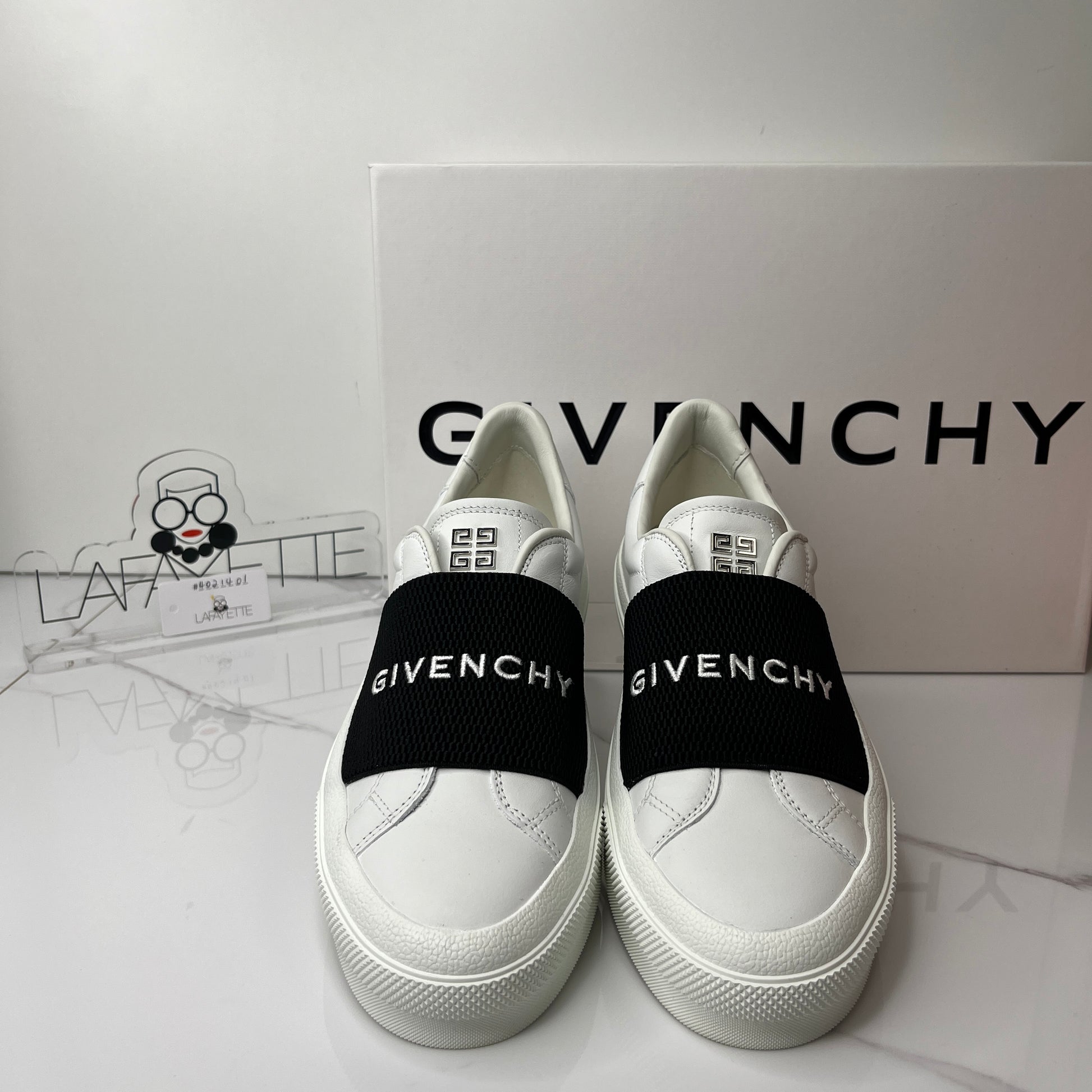 Givenchy City leather slip-on sneakers - Lafayette Consignment