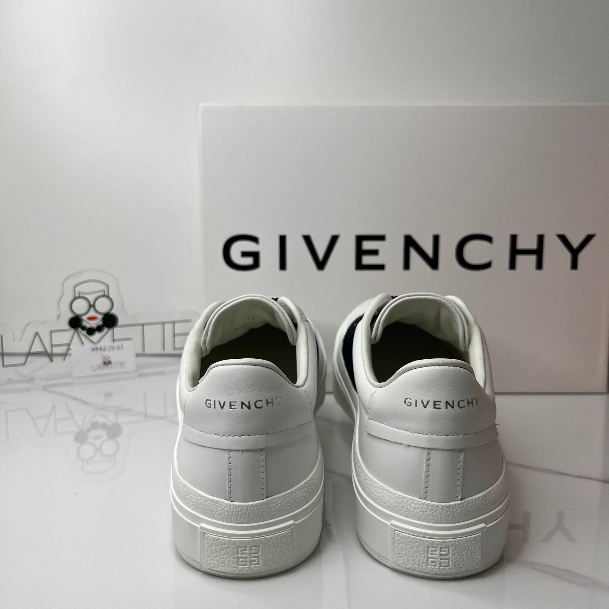 Givenchy City leather slip-on sneakers - Lafayette Consignment