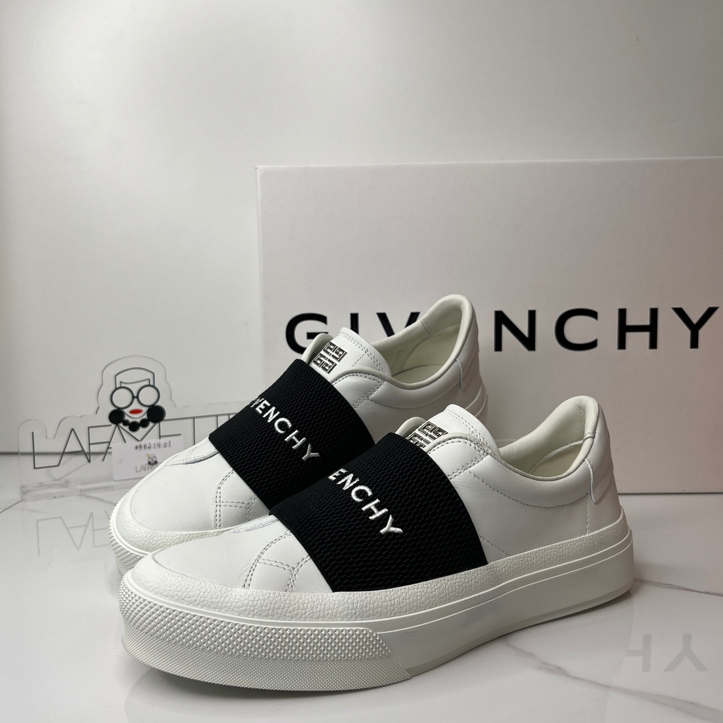 Givenchy City leather slip-on sneakers - Lafayette Consignment