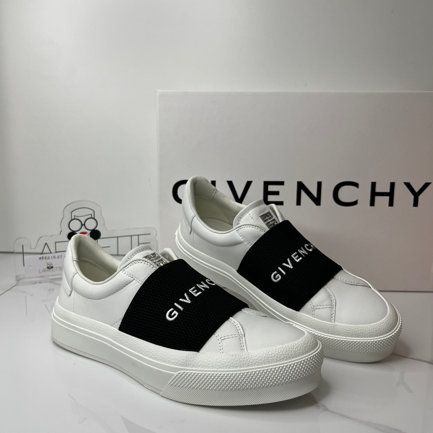 Givenchy City leather slip-on sneakers - Lafayette Consignment