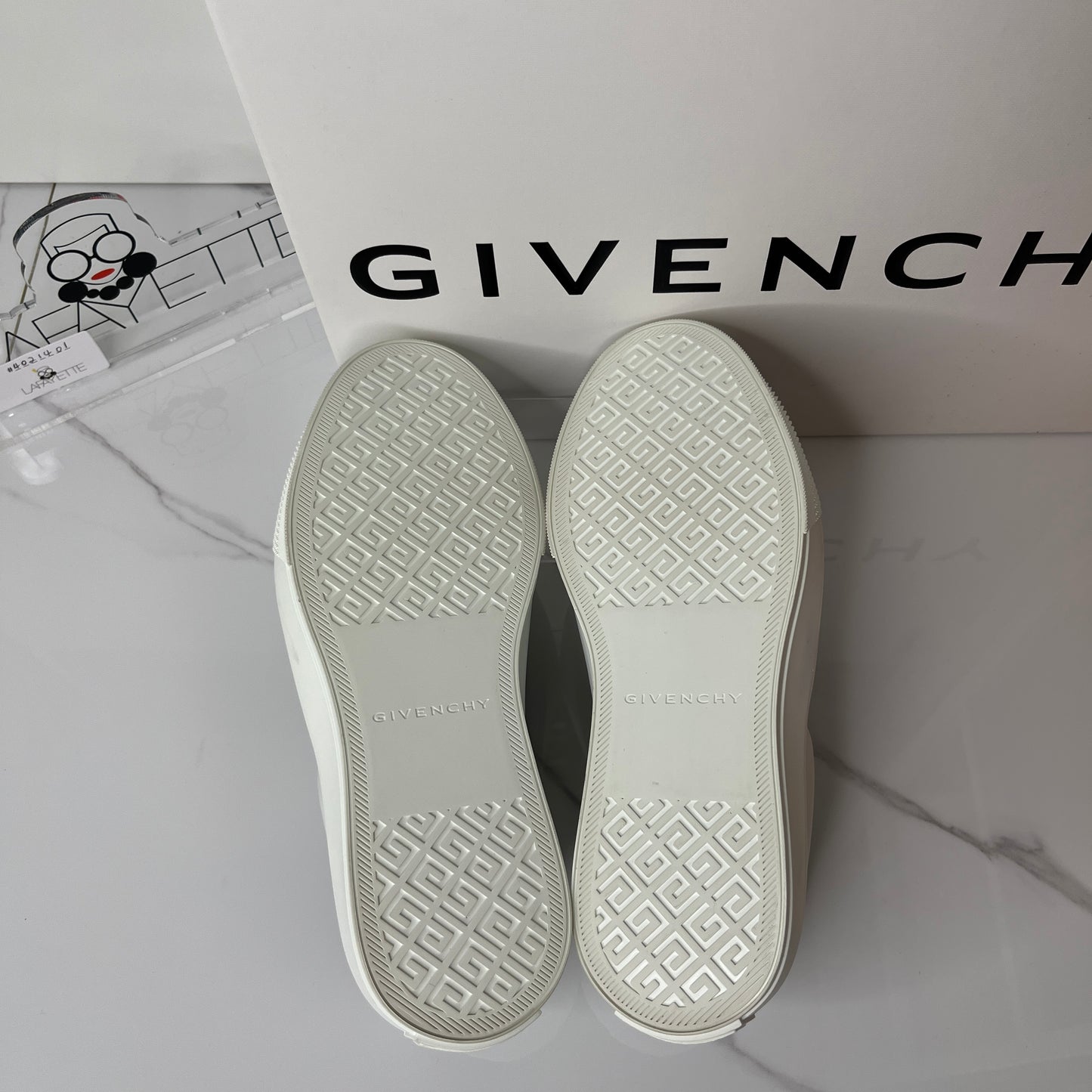 Givenchy City leather slip-on sneakers - Lafayette Consignment