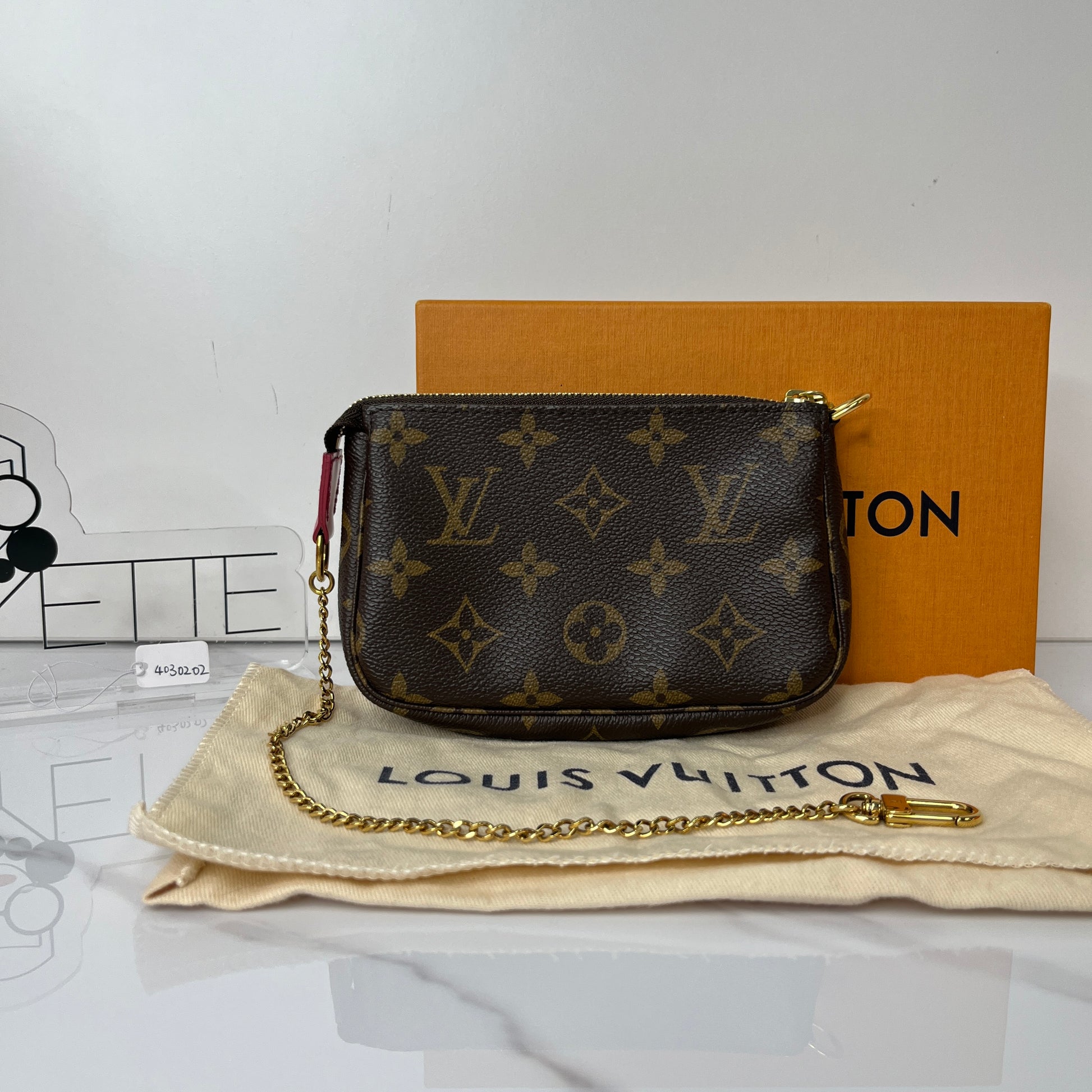 Louis Vuitton Monogram Vivienne Animation Mini Pochette - Lafayette Consignment