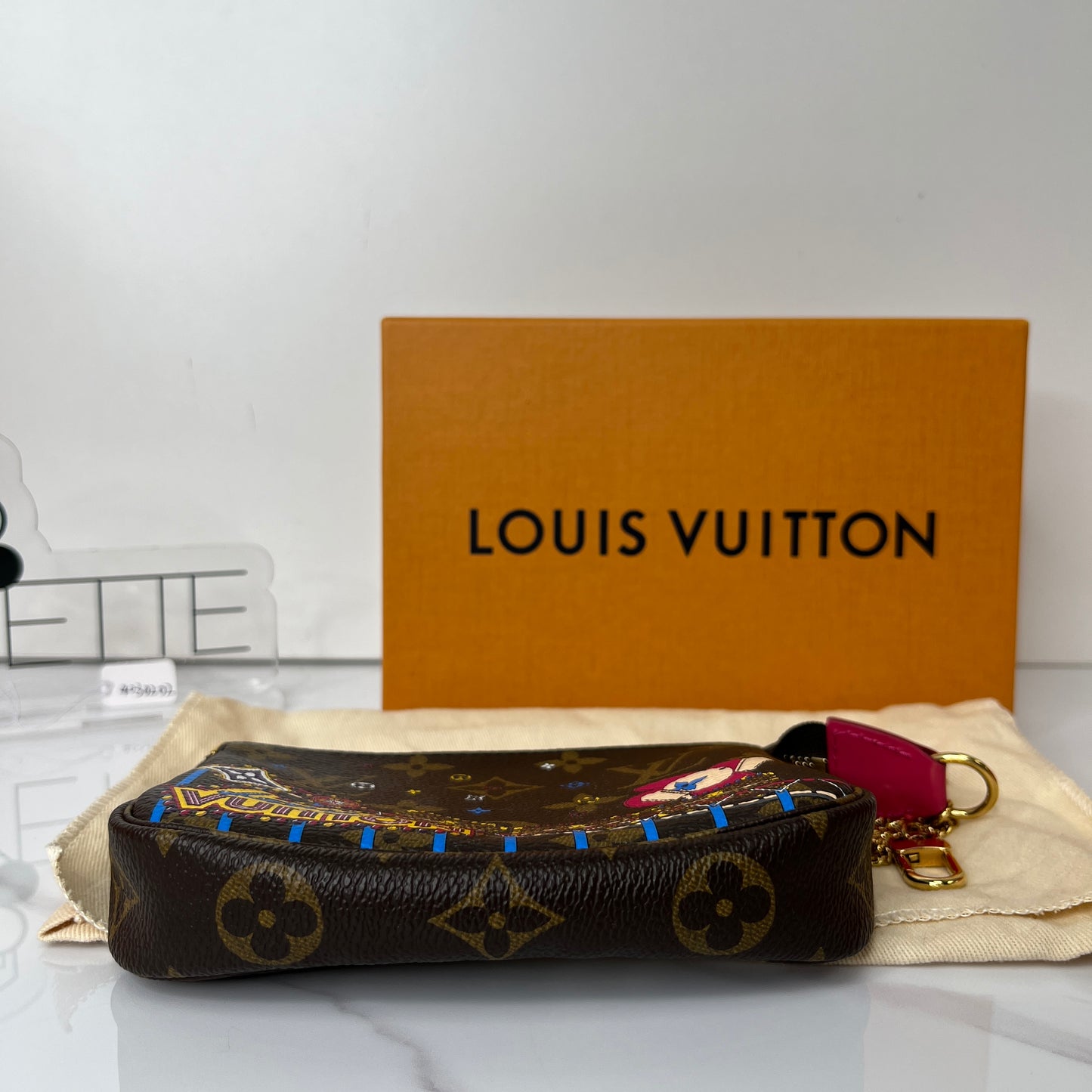 Louis Vuitton Monogram Vivienne Animation Mini Pochette - Lafayette Consignment