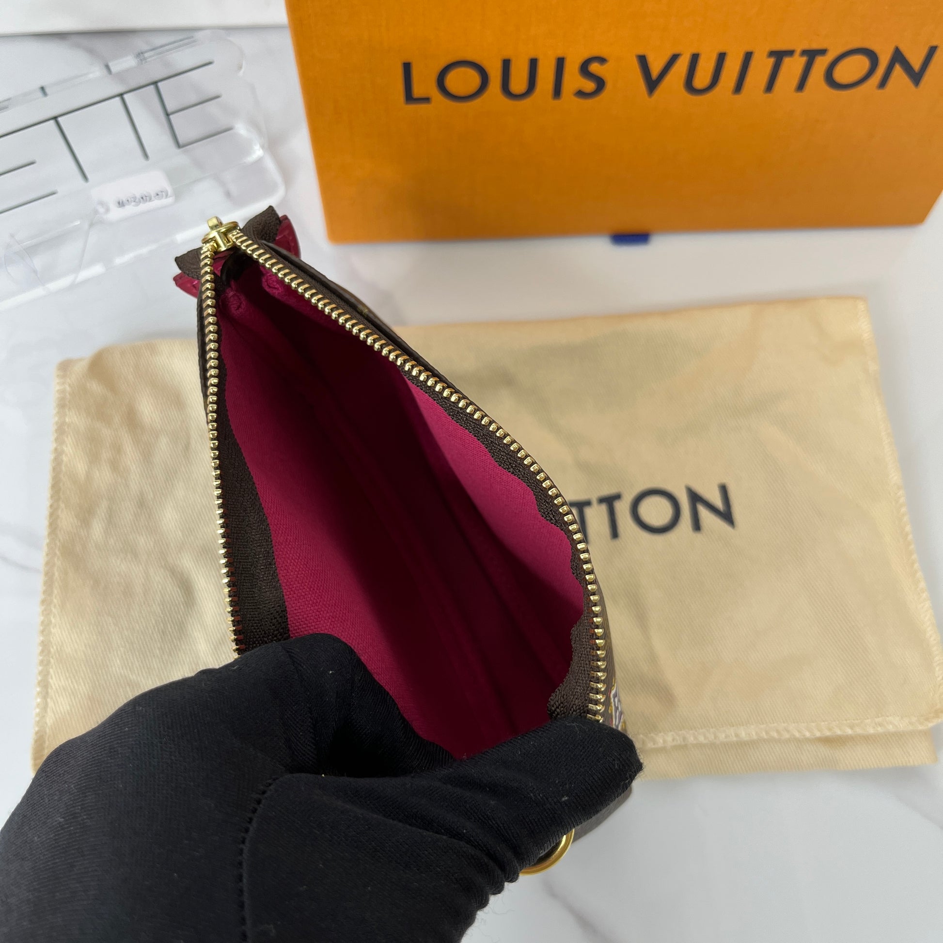 Louis Vuitton Monogram Vivienne Animation Mini Pochette - Lafayette Consignment