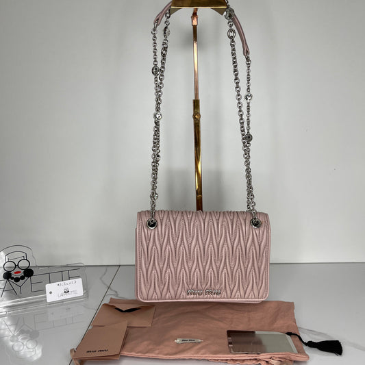 Authentic MiuMiu Mini crossbody in nude pink color